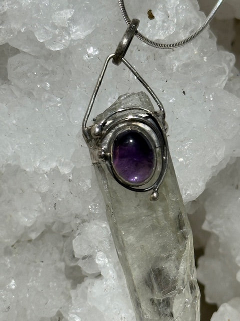 Hiddenite pendant with amethyst (silver setting)